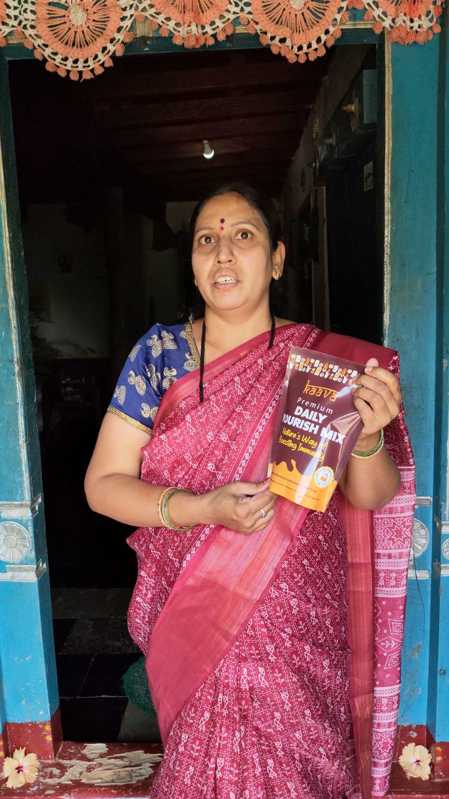 Woman in rural India with Kaava Nourish Mix